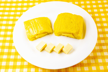 pamonha, Brazilian sweet made from homemade cheese with corn. Open pissing ready for consumption....