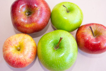 Group of green and red apples seen from above