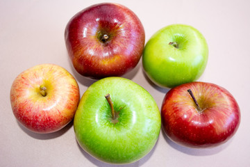 Red and green apples of different shades from above