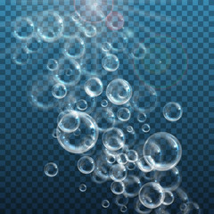 Realistic floating soap bubbles on transparent background. Design element for advertising booklet, flyer or poster