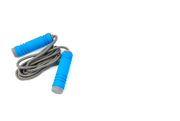 Skipping rope or jumping rope isolated on white background. Selective focus and crop fragment