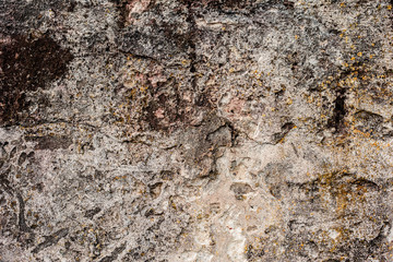 Texture of a concrete wall with cracks and scratches which can be used as a background