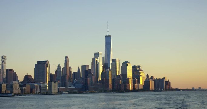 Eye catching Financial District In Manhattan With Famous World Trade Centre On the Incredible Hudson River At Sunset