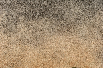 Texture of a concrete wall with cracks and scratches which can be used as a background