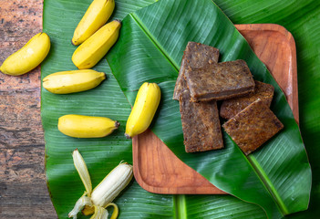 Easter Island Tahitian Polynesian banana pie pupping POE on wooden plate on banana palm tree leaves