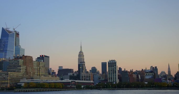 Hudson River At Evening With Beautiful New York Skyline And Massive Impressive Skyscrapers In Incredible NYC