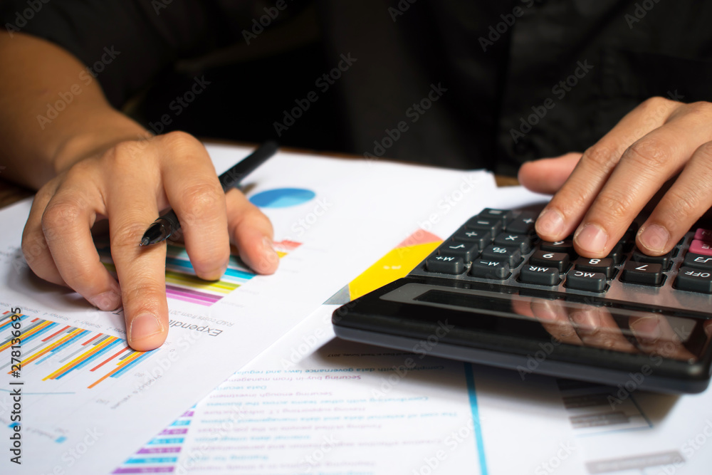 Poster man hand holding pen and calculating numbers.