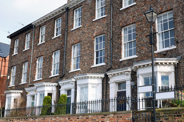 Fototapeta na wymiar British detached houses built with red clinker bricks seen in York