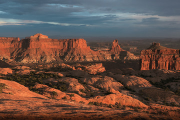 Golden light on canyon buttes near Upheaval Dome - Canyonlands National Park, Utah