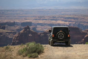 Off Road Vehicle at Shafer Trail Overlook - Canyonlands National Park, Utah