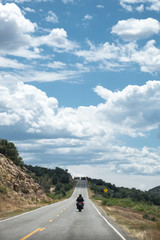 Biker portrait riding on scenic road trip - Highway 145, Colorado