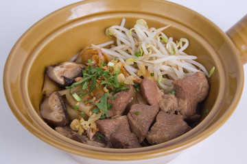 Stewed pork soup with morning glory and bean sprout.