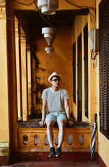 A young man traveler at old town