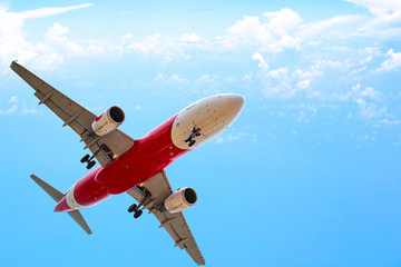 Commercial airplane Flying over cloudy sky