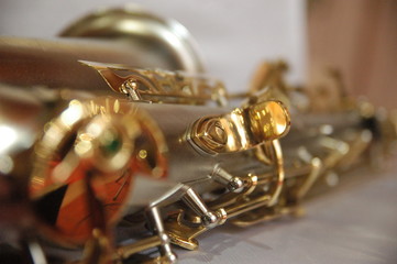 classic musical instrument saxophone gold color close up detail texture
