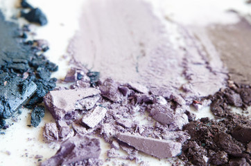 Eyeshadow cosmetic powder scattered. The concept of fashion and beauty industry. Close-up. - Image