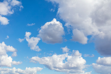 Naklejka na ściany i meble Clouds against blue sky as background