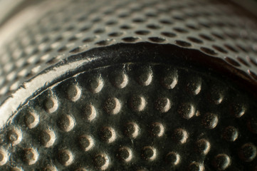 depressions in the surface of a tailors thimble