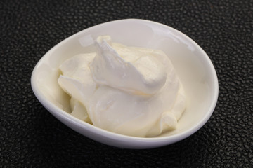Fototapeta na wymiar Sour cream in the bowl