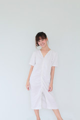 Fashion Portrait of a woman wearing natural fabric linen minimal -  copy space white background