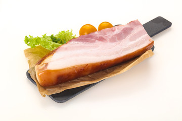 Smoked pork breast with salad leaves