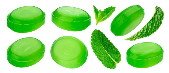 Green mint hard candies isolated on white background