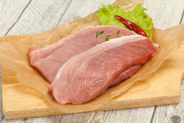 Juicy raw pork steak meat
