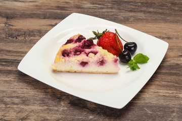 Cheesecake with cherry served strawberry