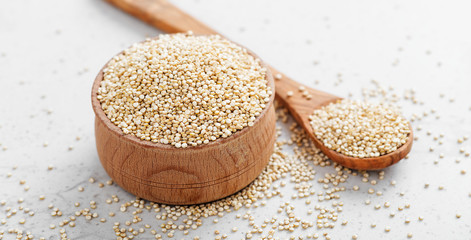 Bowl of healthy white quinoa seeds.