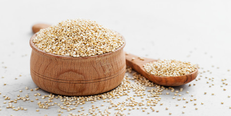 Bowl of healthy white quinoa seeds.