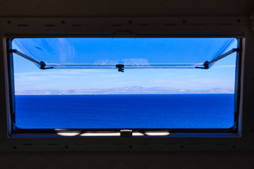 View from camper window on sea water