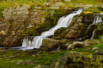 Little waterfall in mountains, Norway.