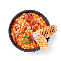 Stewed white beans with smoked sausage and tomato sauce. Bean soup. isolated on white background 