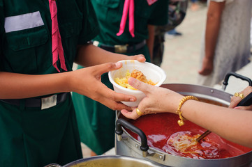 Help serving free food to the poor Needy : concept Sharing Food With Homeless