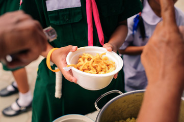 concept Tackling Hunger and Food : Donate food to the poor and the poor who suffer from starvation
