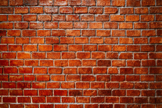Old red bricks wall for texture background.