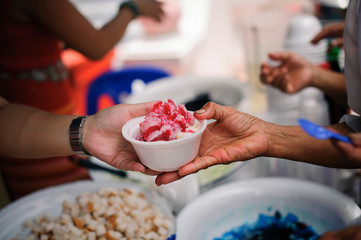 Volunteers Share Food to the Poor to Relieve Hunger : Beggar begs food from donors