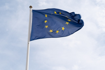 European Union (EU) Flag Waving in cloud sky background