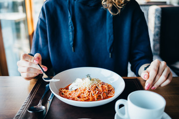 Plate of gourmet spaghetti with tomato sauce
