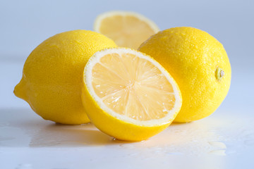 Juicy lemons on a combined background. Fruits and vitamins
