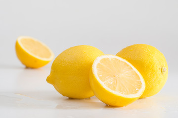 Juicy lemons on a combined background. Fruits and vitamins