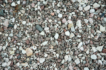 photo background of small eamens of granite and pebbles