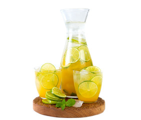 Natural orange lemonade with citrus and mint on white background. Detox drink for a healthy lifestyle.