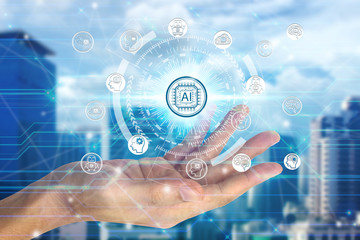 Hand holding with virtual screen Artificial Intelligence technology icon over the Network connection, Artificial Intelligence Technology Concept.