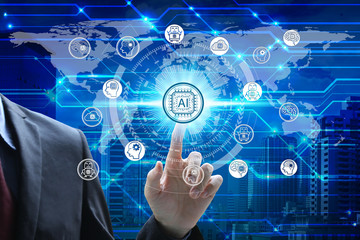 Businessman hand touching virtual screen Artificial Intelligence technology icon over the Network connection, Artificial Intelligence Technology Concept.