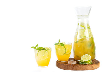 Natural orange lemonade with citrus and mint on white background. Detox drink for a healthy lifestyle.