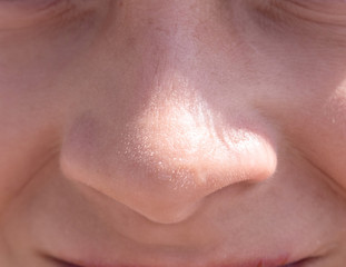 Nose teen boy close up front view