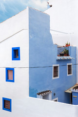 Fototapeta na wymiar Small blue house with small windows and patio, Villajoyosa, Spain, Apr.2019
