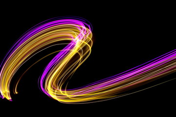 Long exposure light painting photography, curvy lines of vibrant neon pink purple and metallic...