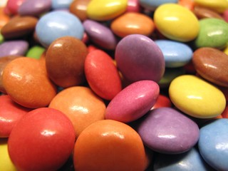 Colourful colorful candies sweets chocolates buttons Smarties Skittles M&M’s